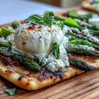 Roasted Asparagus Flatbread with Burrata: golden crust, tender asparagus, creamy cheese.